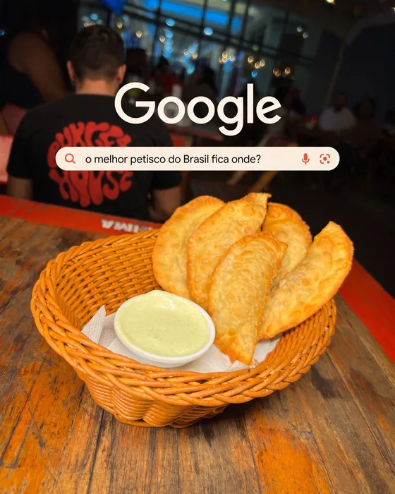 Post de petisco com referência à busca no Google